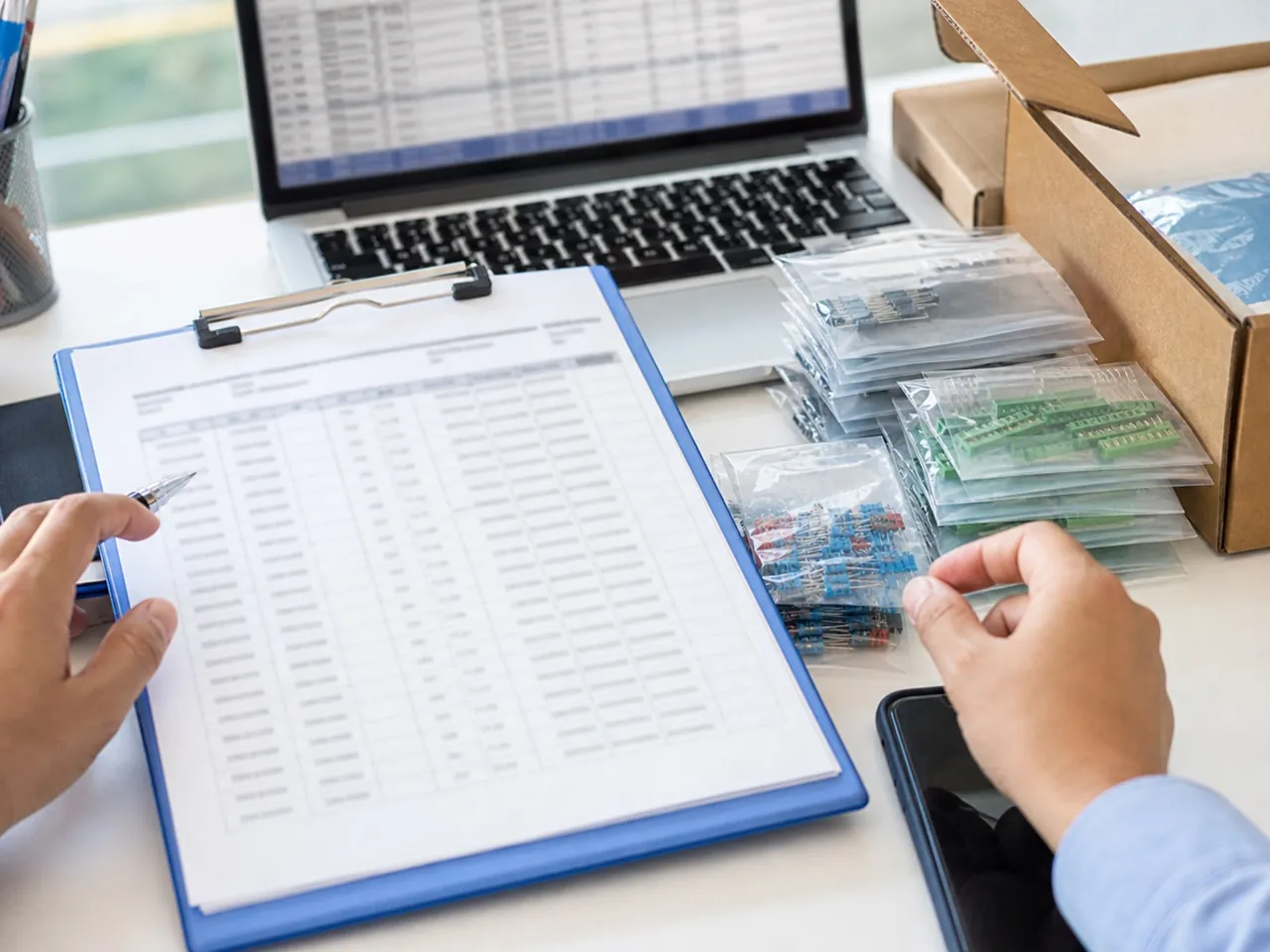 Desk with an electronic inventory list prepared for inquiry